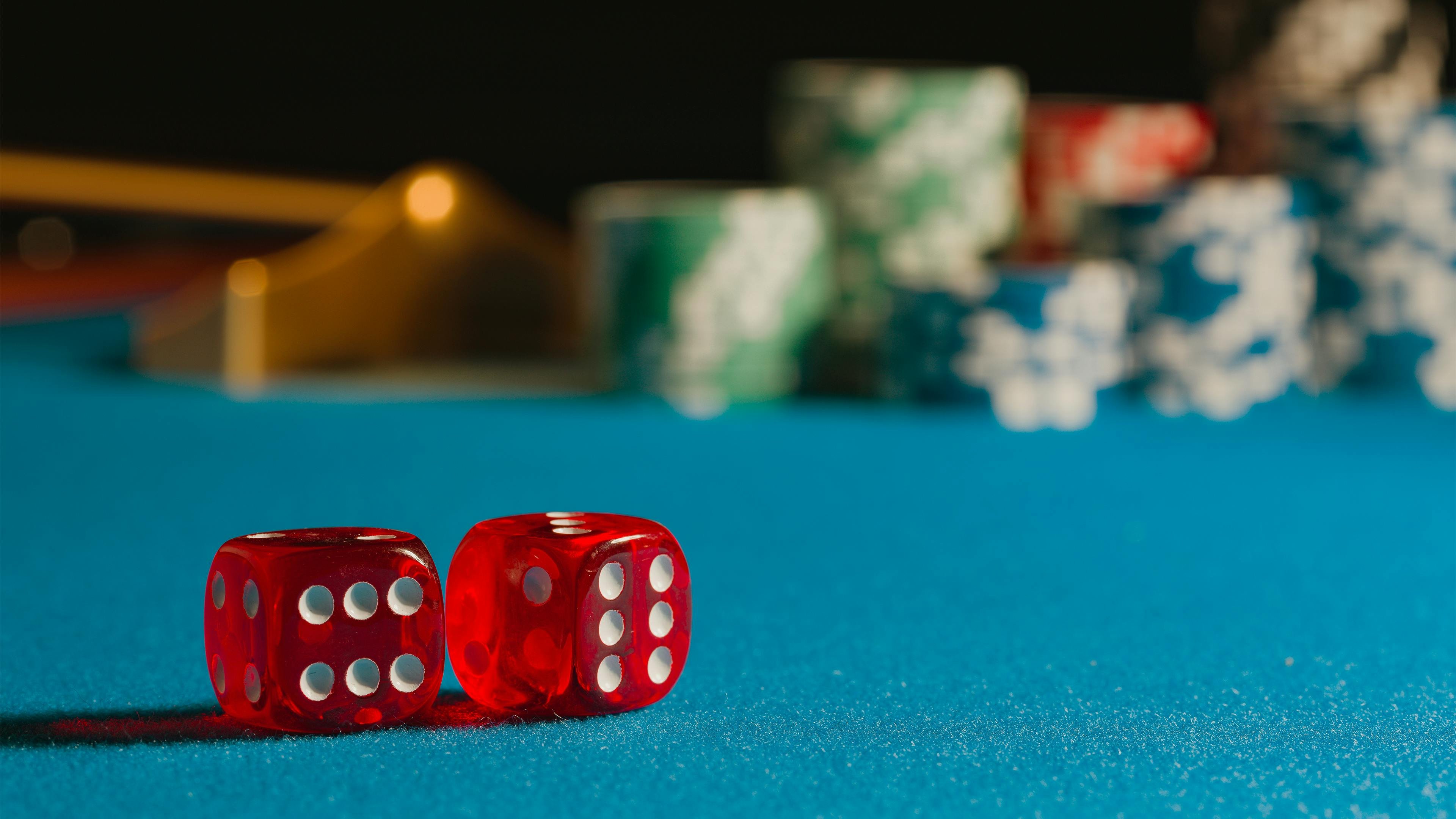 Mobile interface displaying card game lobby with multiple table options